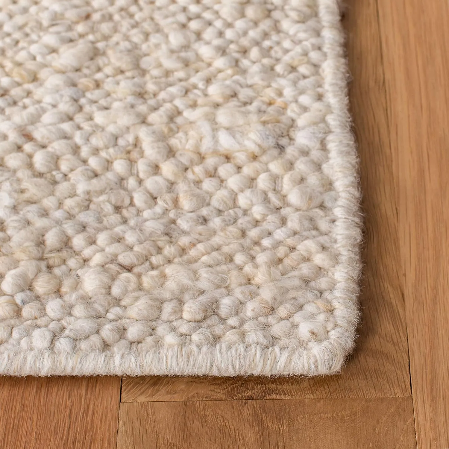 SAFAVIEH Natura Collection Area Rug - 5' x 8', Ivory, Handmade Wool, Ideal for High Traffic Areas in Living Room, Bedroom (NAT263A)