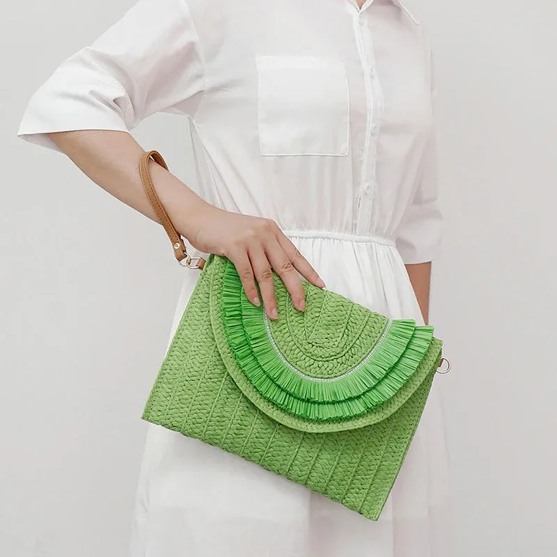 SOLEI WOVEN TASSEL CLUTCH